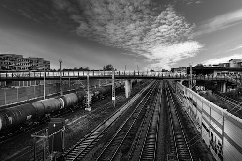 Grayscale Photo of Railroads