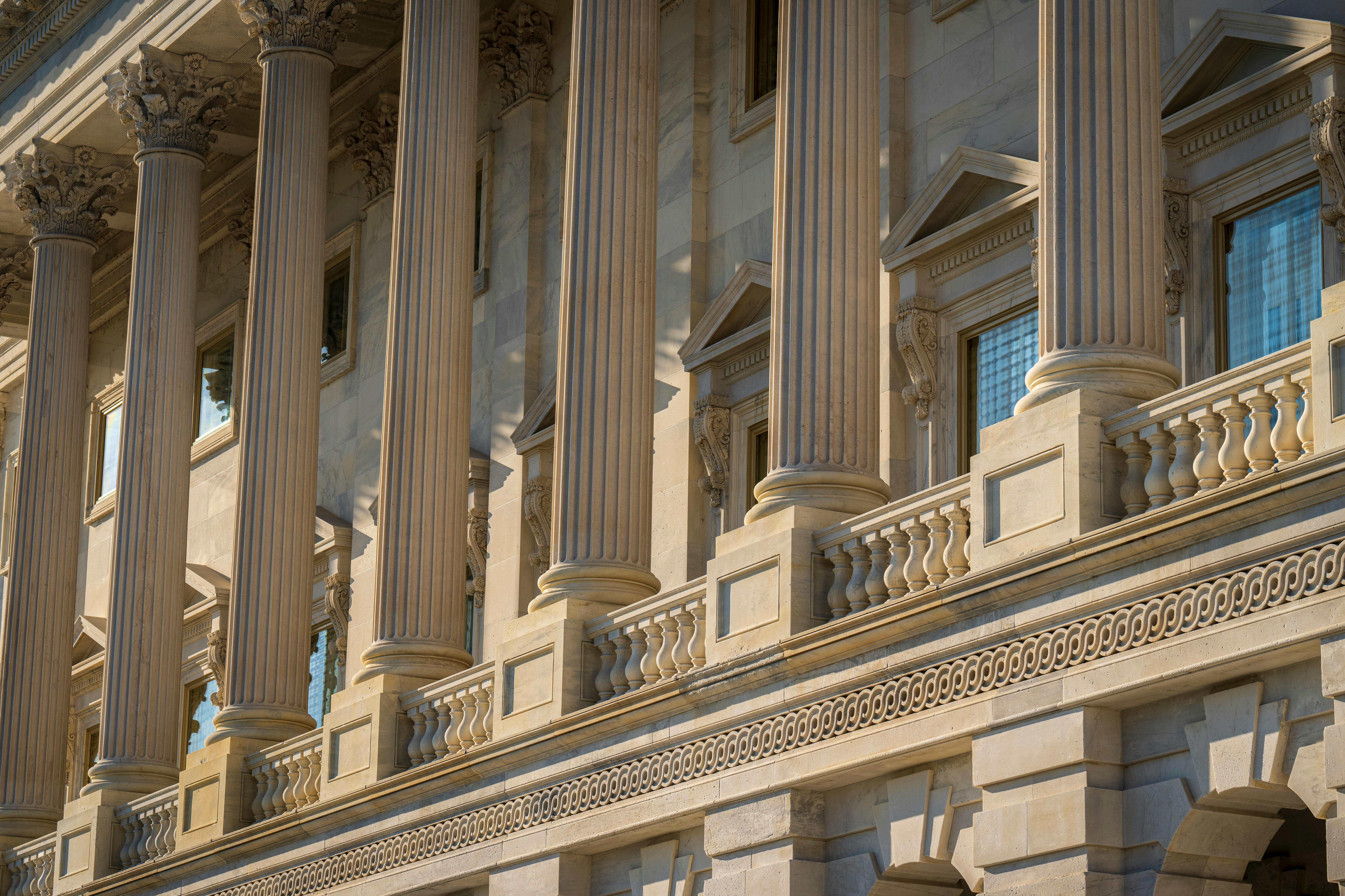 Close-up of columns and exterior architectural details of a historic landmark building.