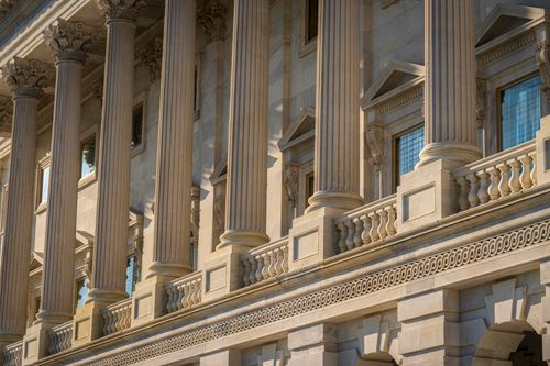 Free Close-up of columns and exterior architectural details of a historic landmark building. Stock Photo