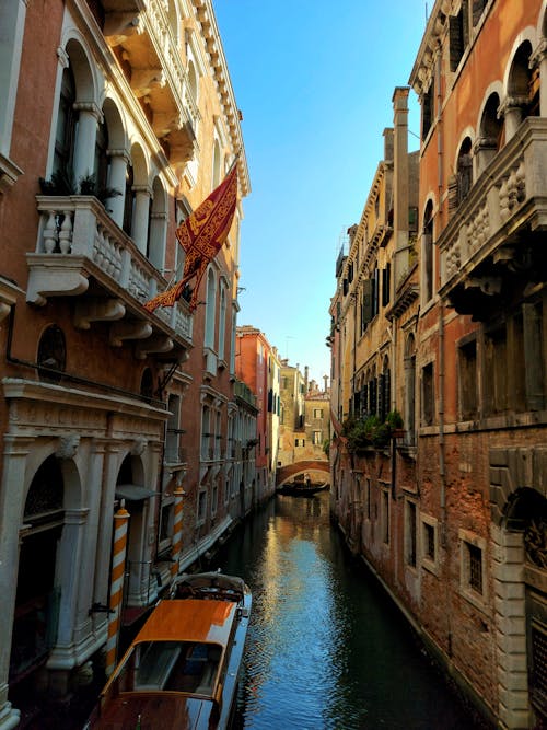 Free Canal in Between City Buildings Stock Photo