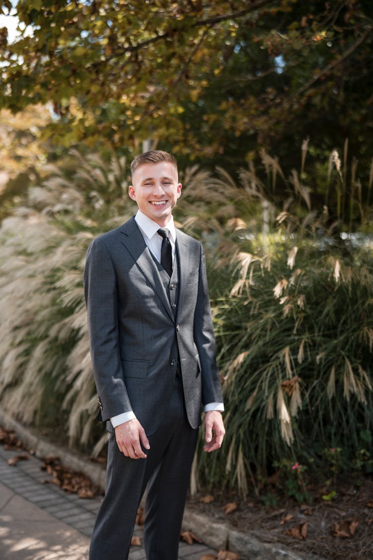 A Man In Black Suit Jacket