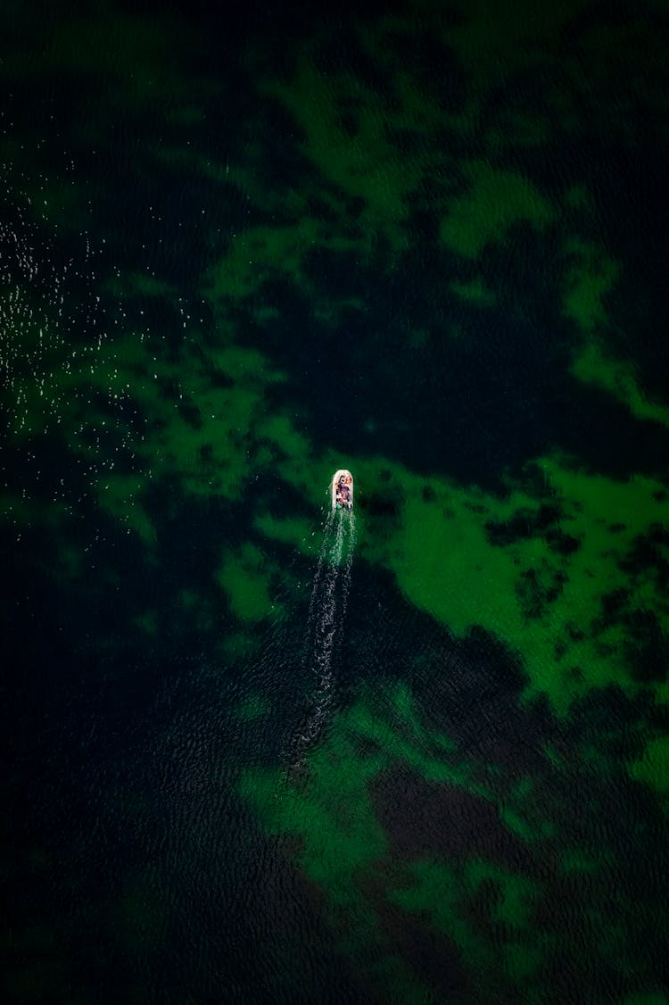 Aerial View Of Boat On The Lake