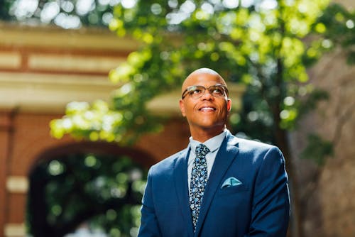 A Man in Blue Suit Jacket