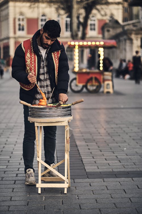 A Man Selling Food on the Street