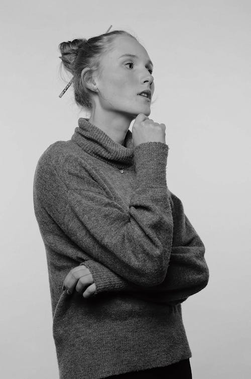A Woman in Gray Sweater
