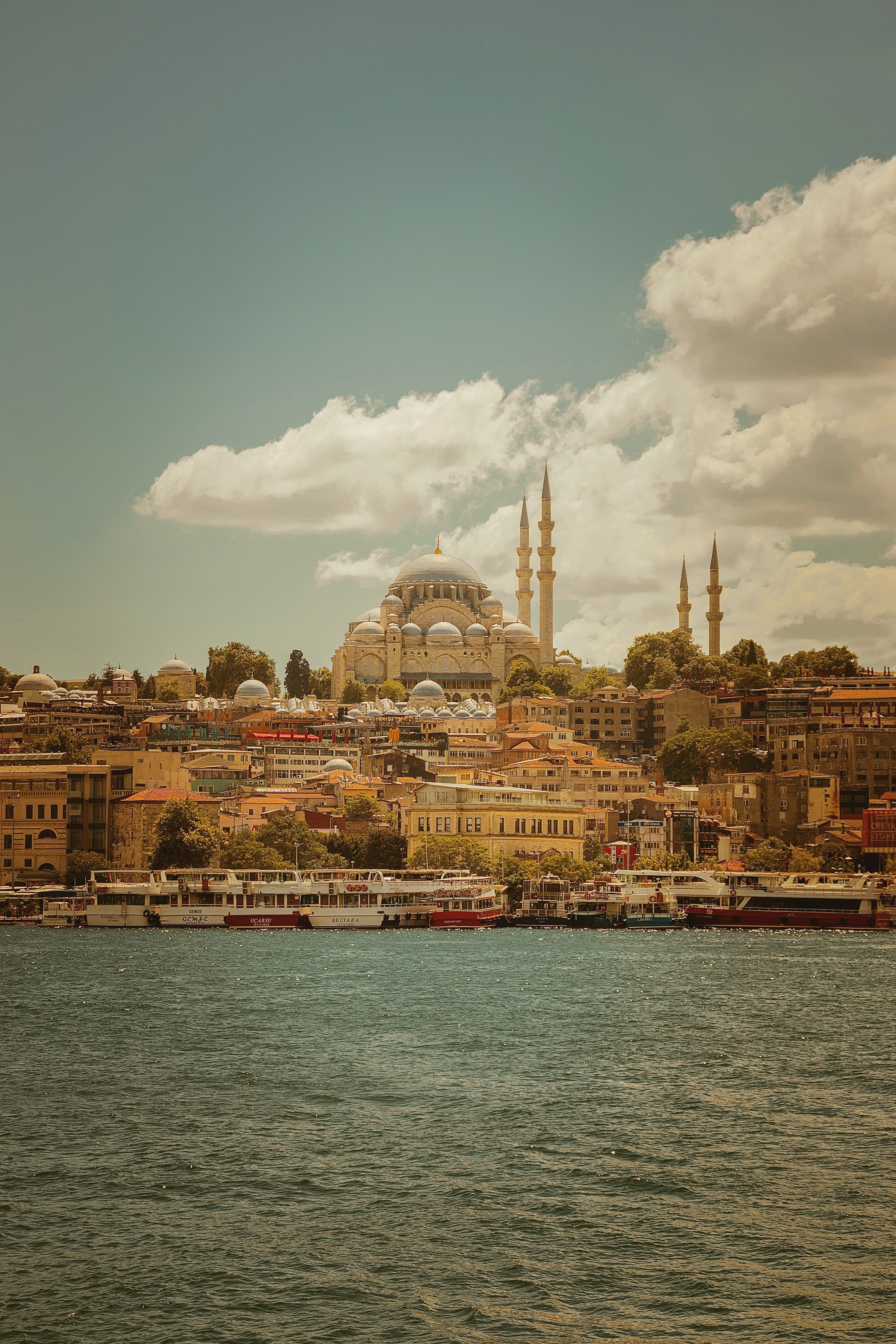 City Buildings Across the River · Free Stock Photo