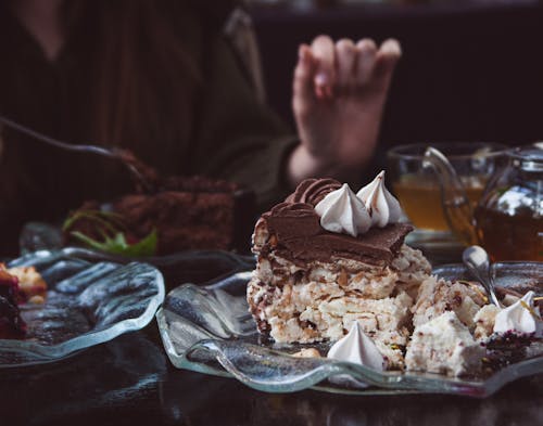 Brown and White Cake on Glass plate