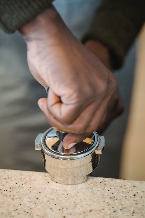 Barista Using Portafilter