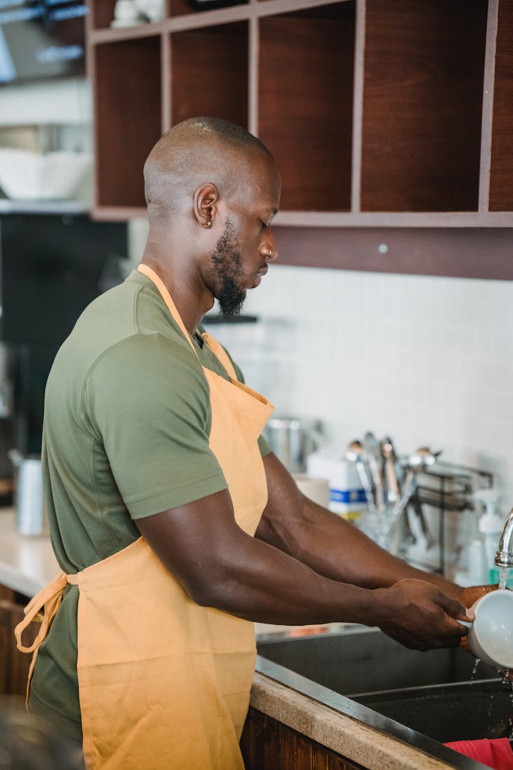 Man Washing Dishes