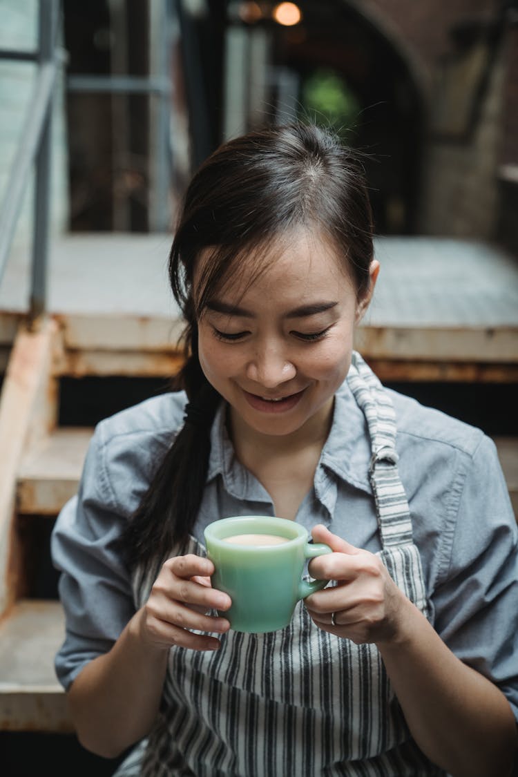 Woman Enjoying Her Coffee