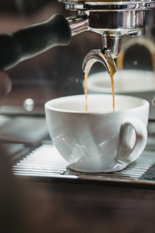 Close-up of Espresso Pouring From the Machine into the Cup