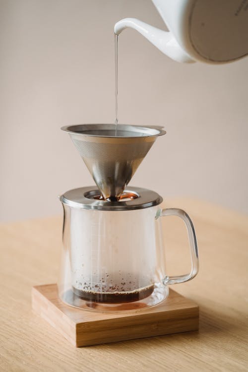 Making a Coffee by Using a Metal Coffee Filter 