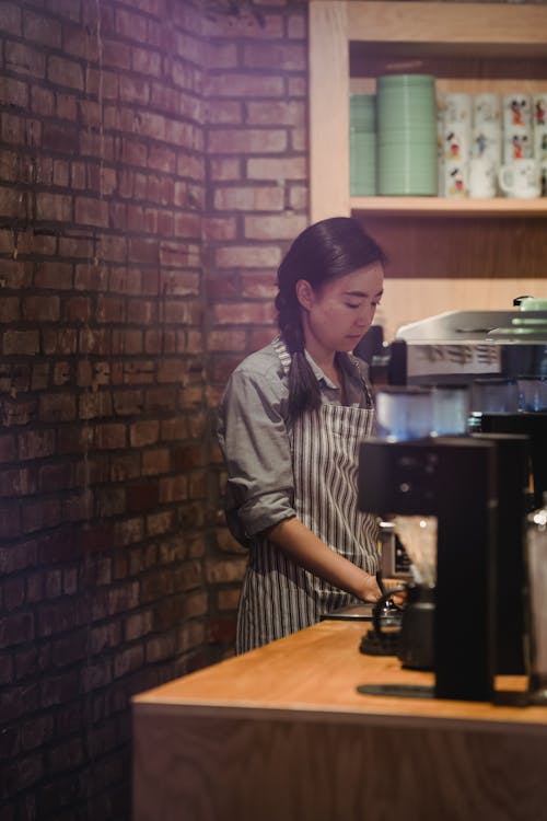 Barista Preparing a Coffee