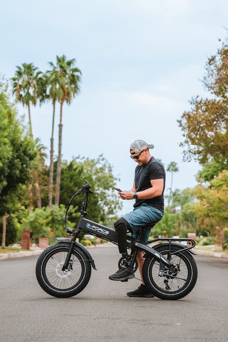 Smiling Man On Electric Bike