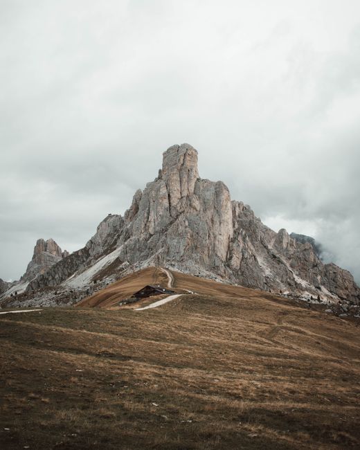 Scenic view of the towering Dolomites with a dramatic sky in Trentino-South Tyrol, Italy.