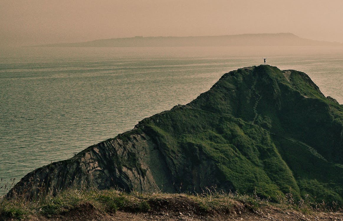 Dive Into Shark Fu: Meg Joins Granblue Fantasy Versus: Rising on October 15 3 A close-up of a person holding a video game controller with their thumbs on the joysticks.