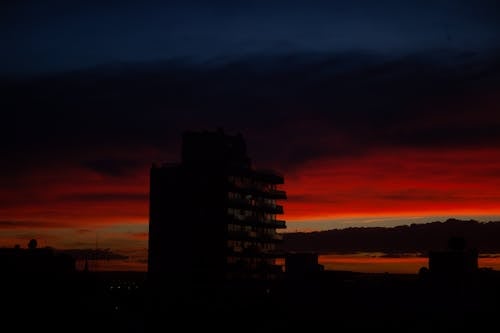 Silhouette of a Building During Sunset
