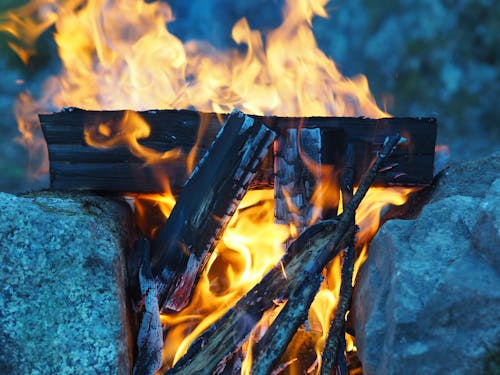 Burning Firewood on Rocks