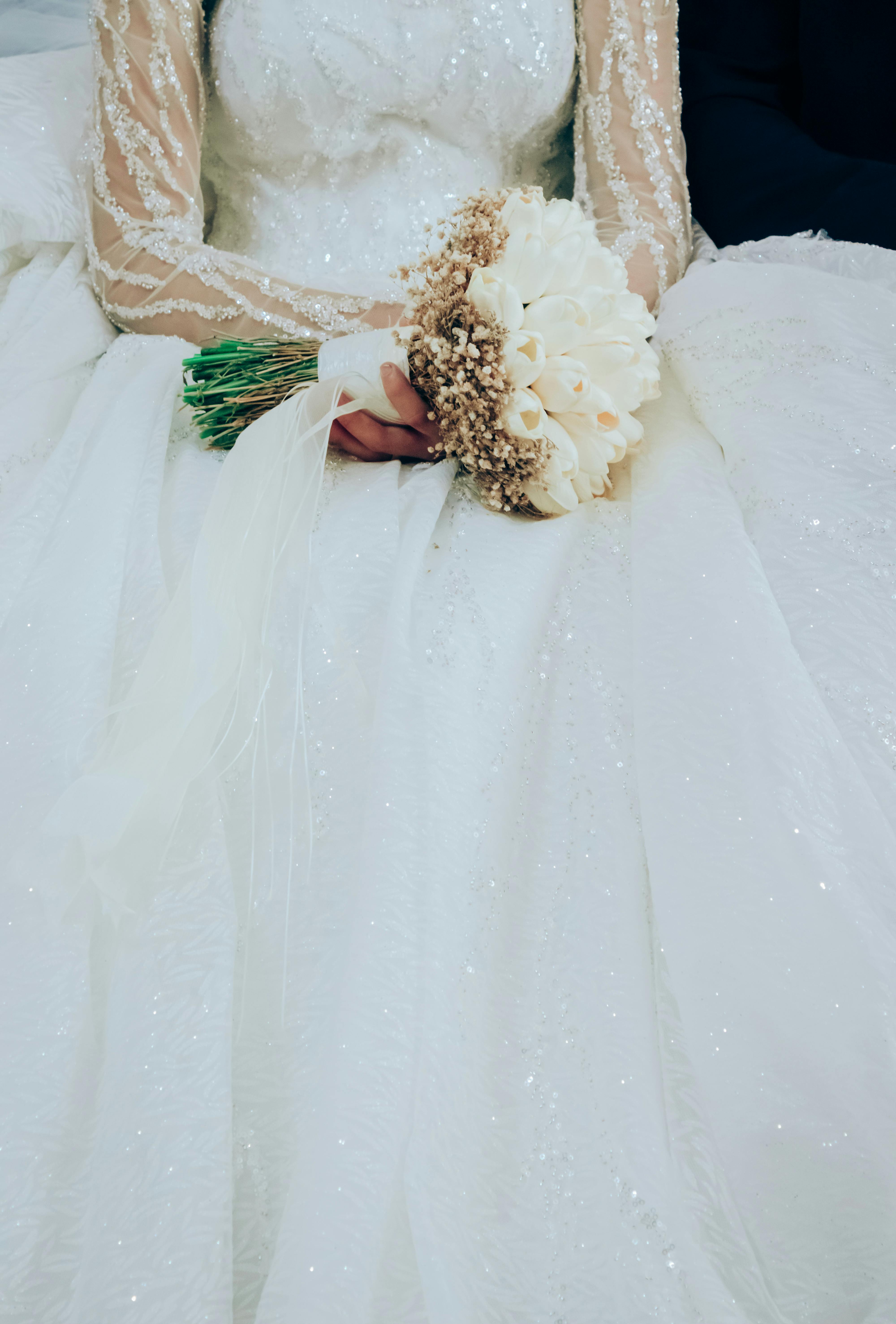 A Bride Wearing Her Wedding Gown · Free Stock Photo