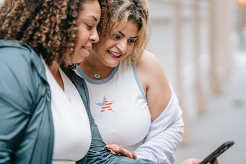 Women Looking at Cellphone