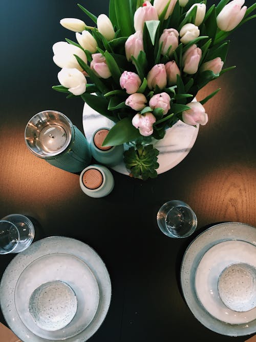 Free Pink and White Tulips Centerpiece on Table Stock Photo