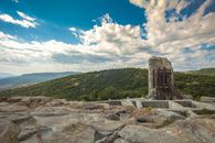 Explore the stunning ancient ruins at Perperikon amidst lush landscapes and rocky terrains.