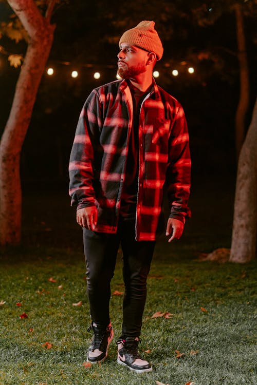 A Man in a Checkered Long Sleeves and Beanie