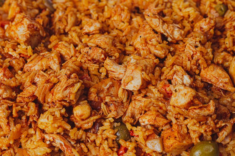 Red Rice Dish With Meat In Close Up Photography