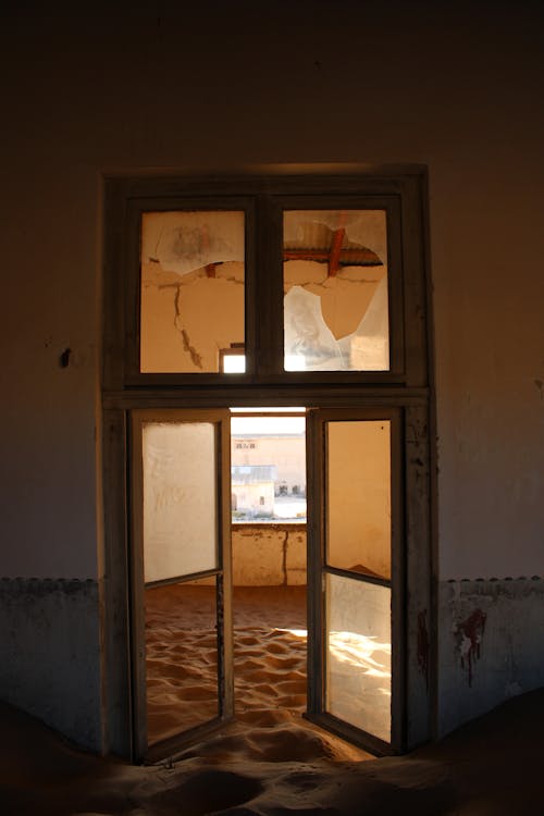 Interior of an Abandoned Building with Sand on the Floor 