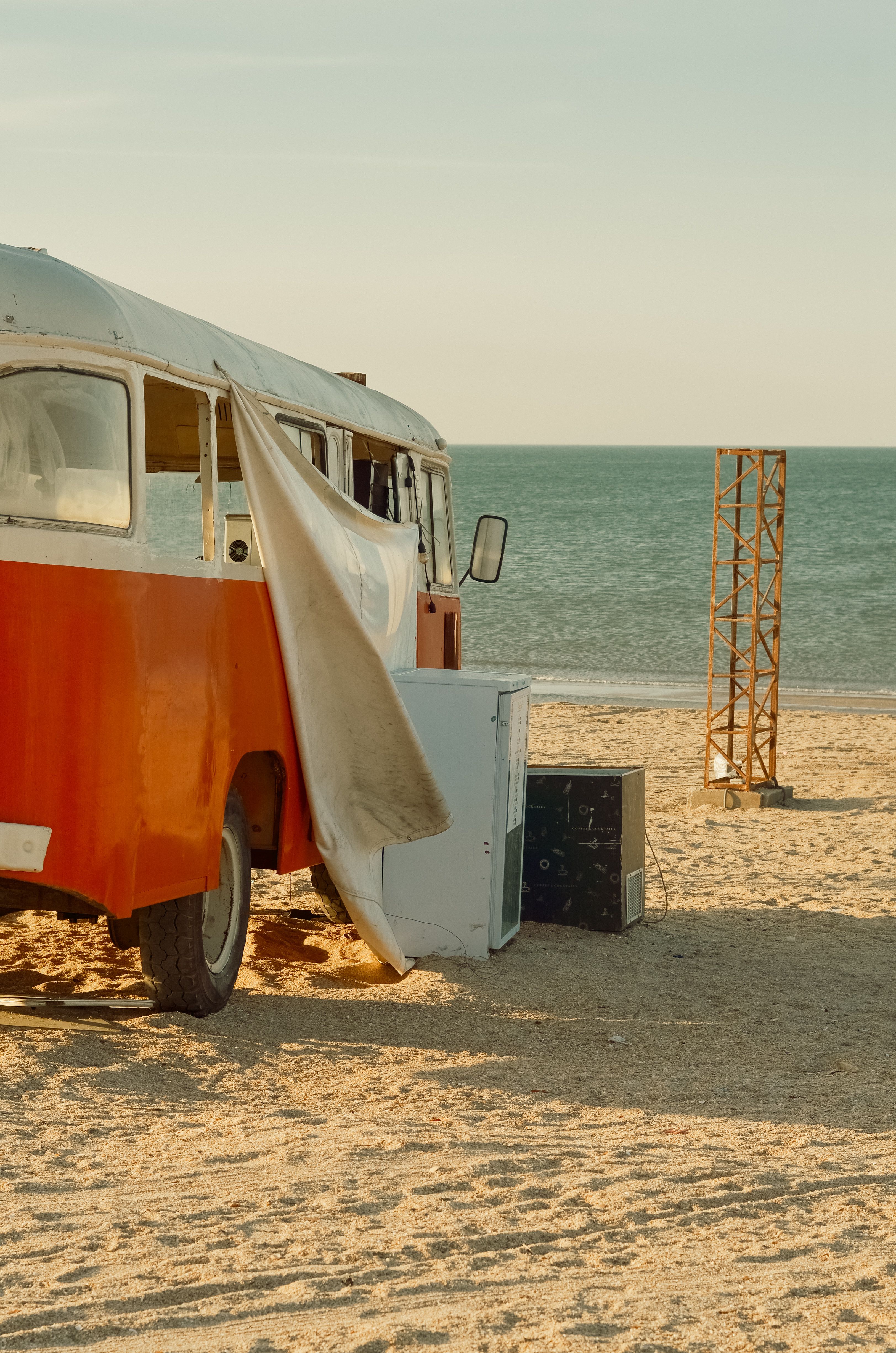 A Camper Van Parked on the Beach · Free Stock Photo