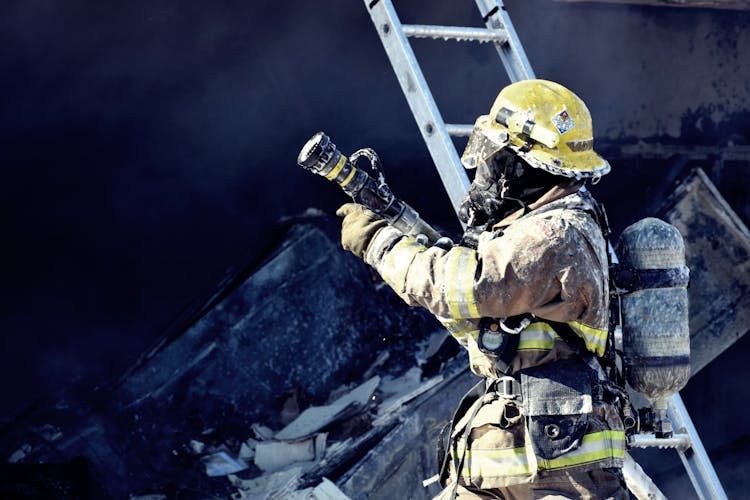 Firefighter Holding Water Hose