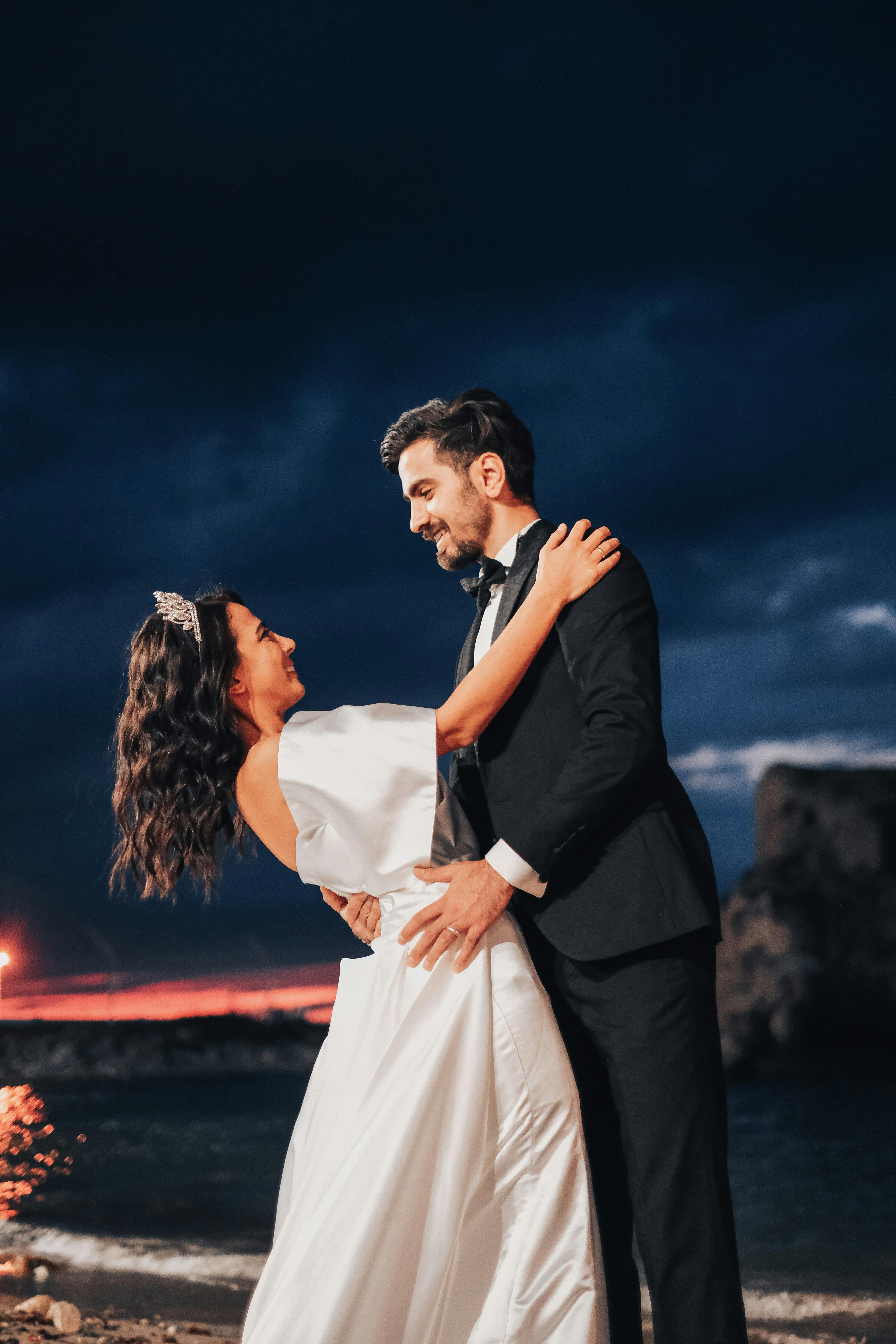 A Happy Couple Facing Each Other Touching Noses · Free Stock Photo