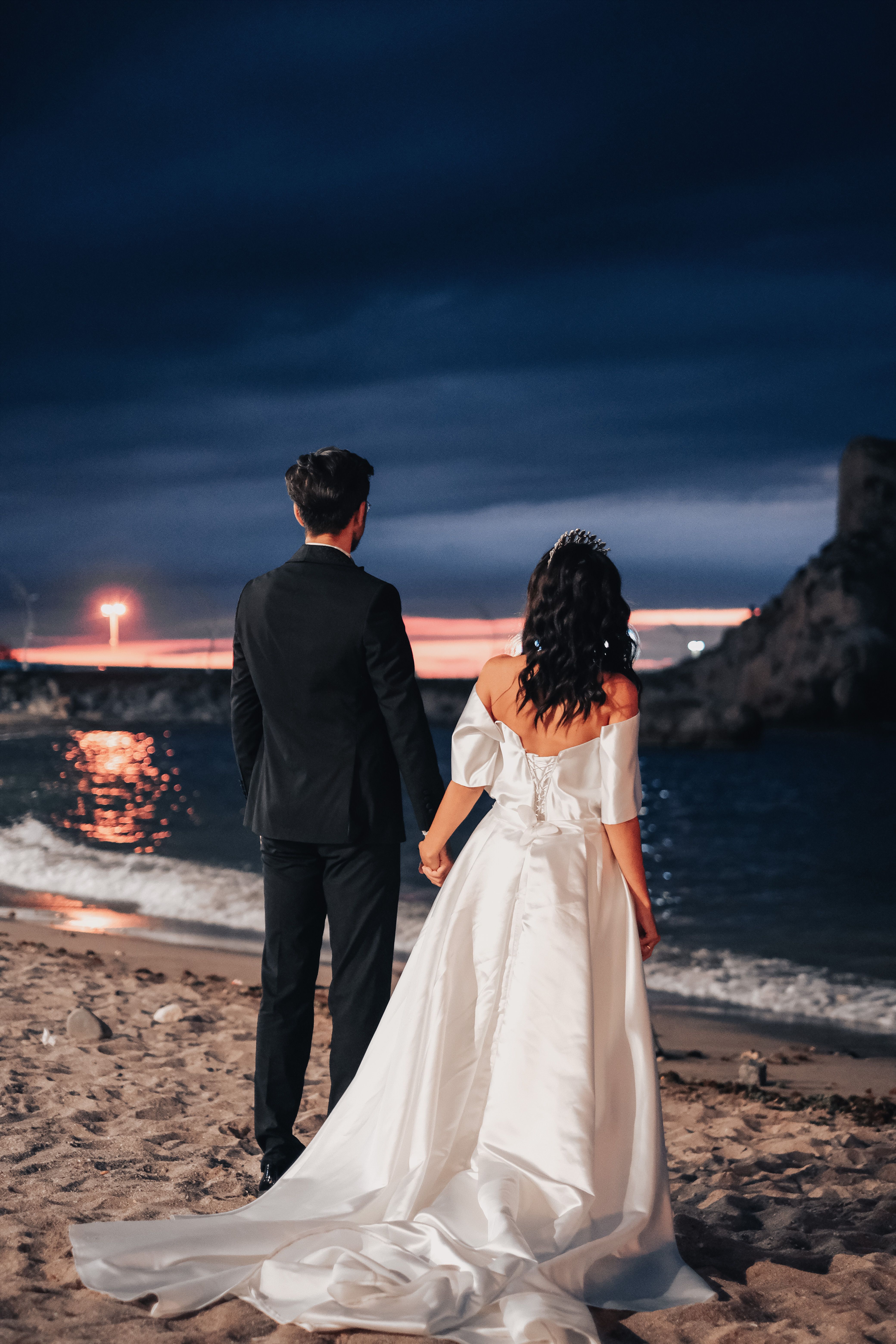 Man and Woman Standing on Beach during Sunset · Free Stock Photo