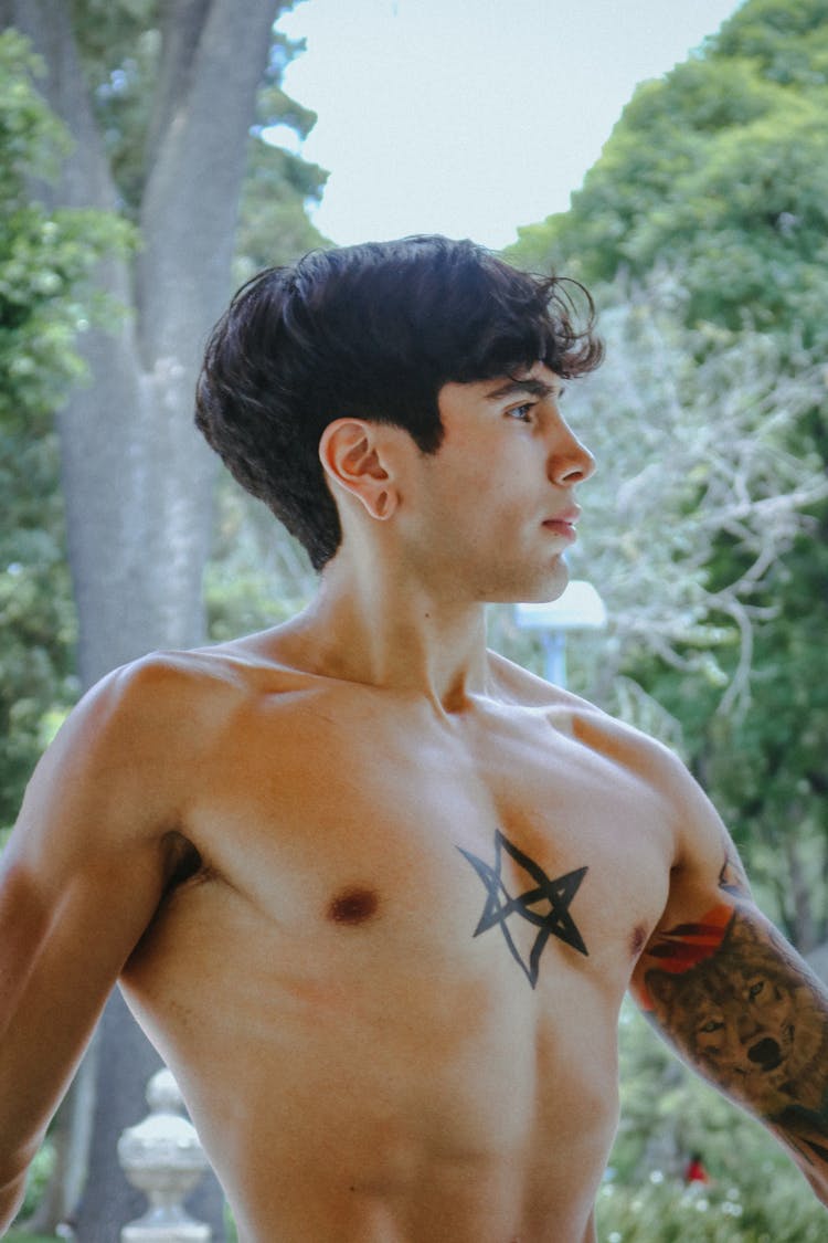 Young Muscular Man With Tattoos