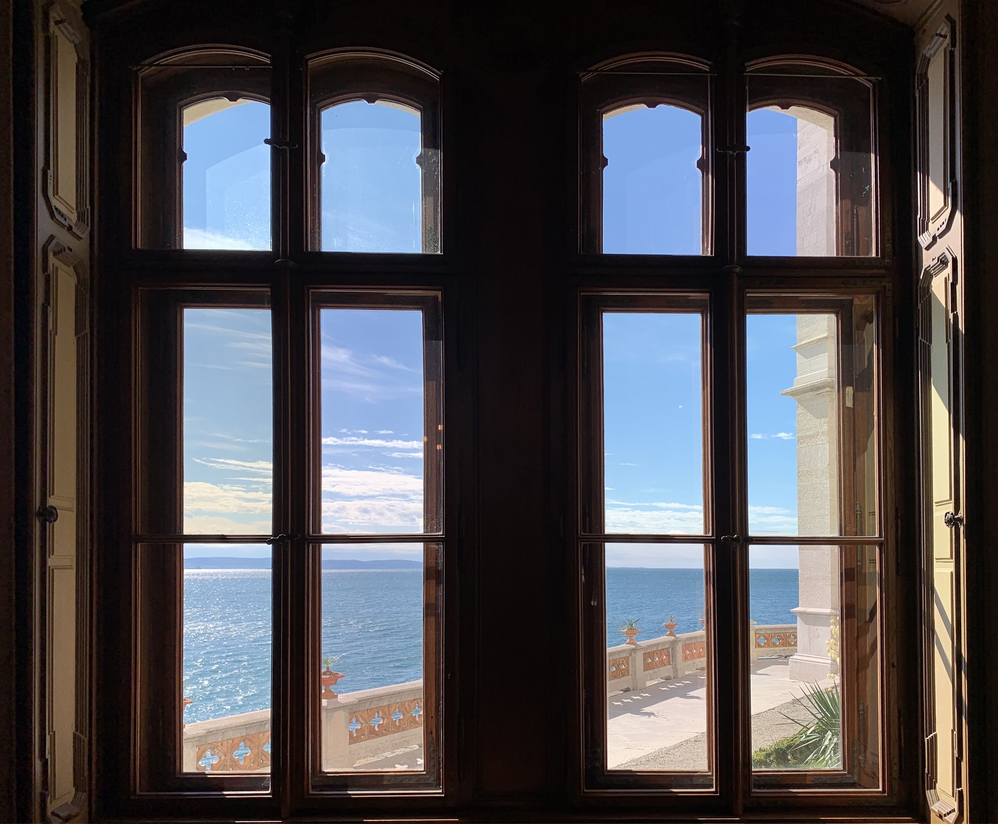 View of a Sea from the Window of an Old Building · Free Stock Photo