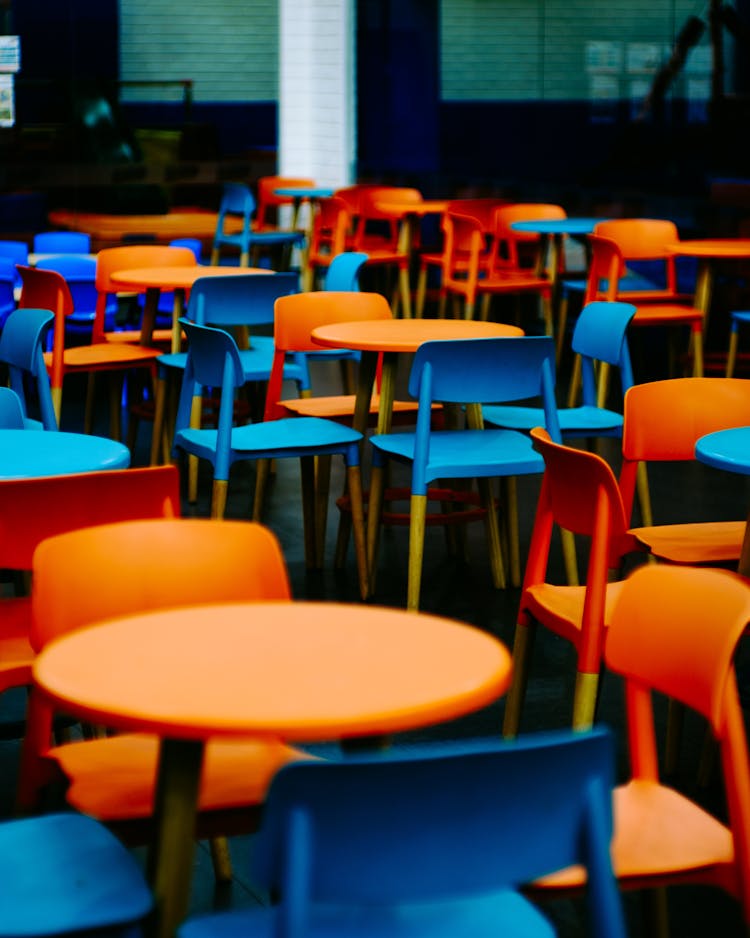 Blue And Orange Chairs In Room