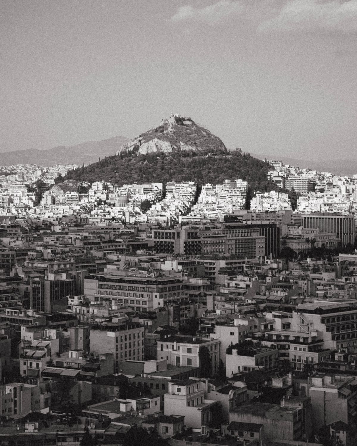 Hill over City in Black and White · Free Stock Photo