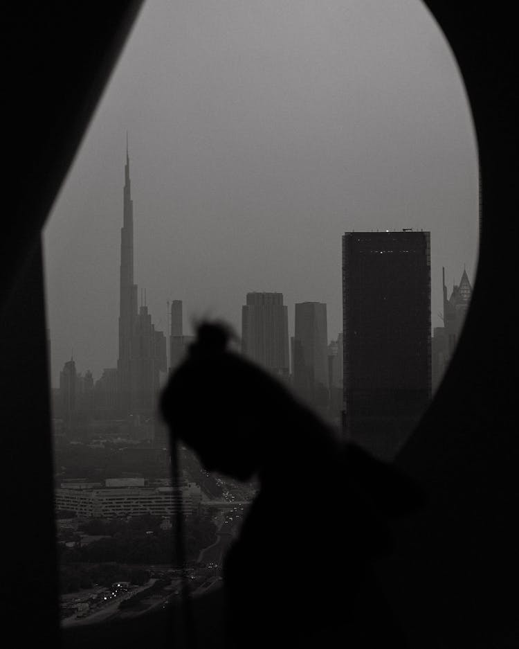 Silhouette Of A Woman And The Cityscape Of Dubai From The Dubai Frame