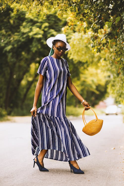 Woman Holding Yellow Handbag