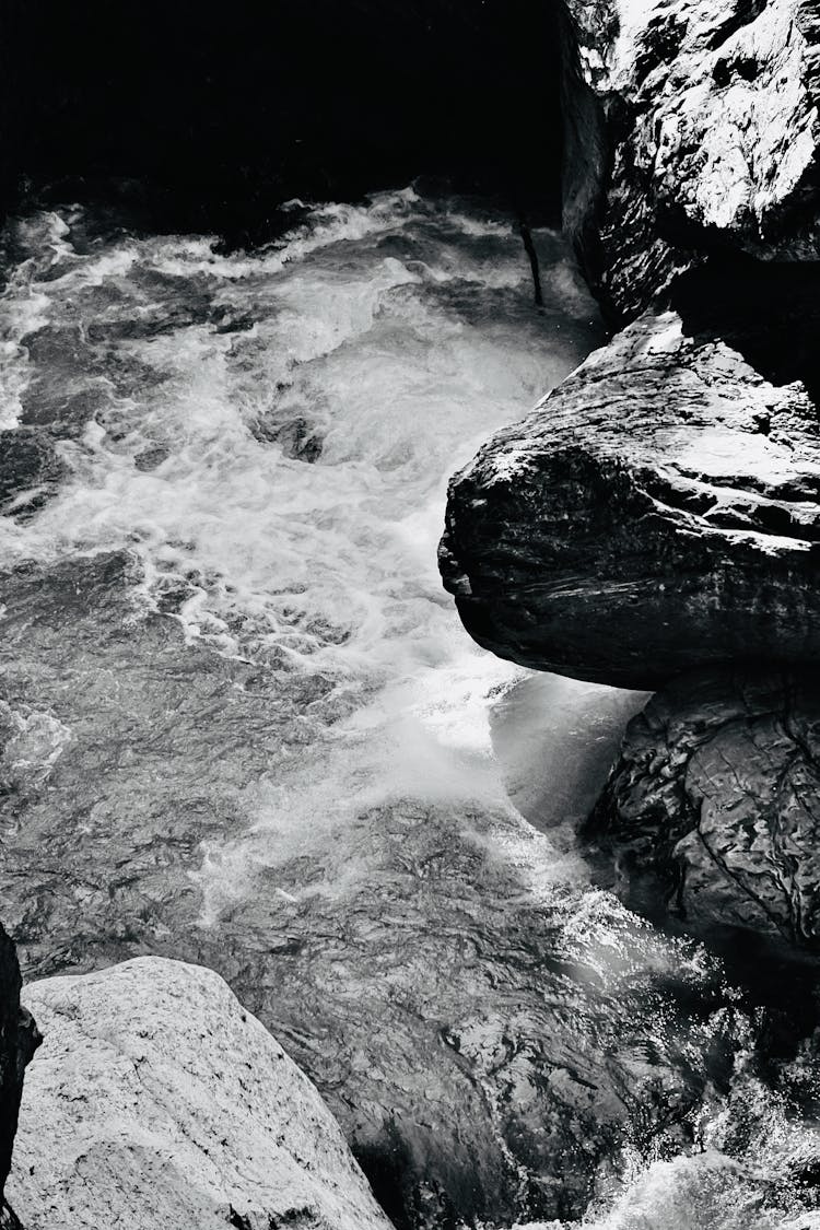 Water Falling Down Rocks In Black And White