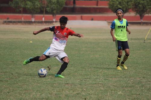 Free Two soccer players in action on the field during a match, showcasing athleticism. Stock Photo