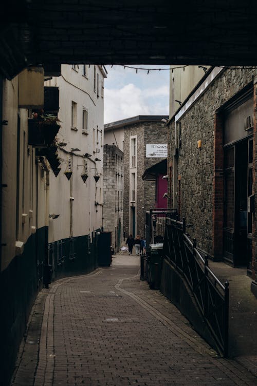 Narrow Street in Between the Concrete Buildings