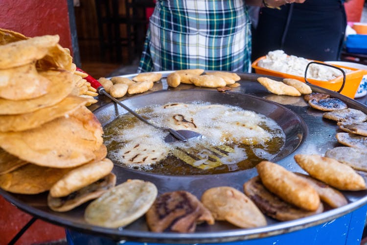 Close-up Of Frying Flatbread In Big Pan