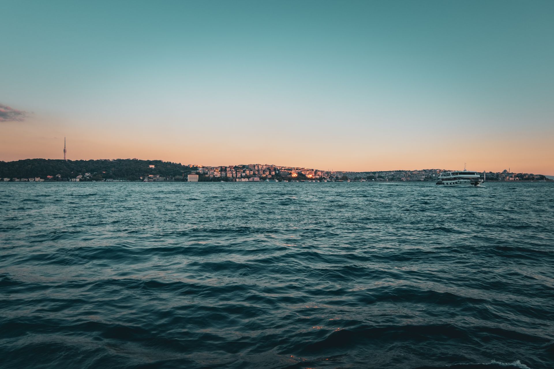 Istanbul Bosphorus skyline at sunset along the coastline