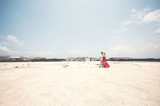 Couple Standing on White Stand
