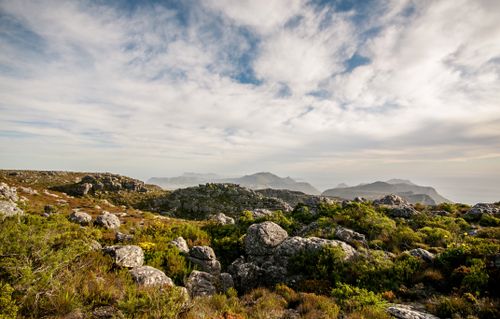 Free Stunning view of rocky terrain under a dramatic sky in a mountainous landscape, perfect for nature enthusiasts. Stock Photo