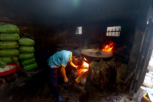 Person Cooking using Firewood