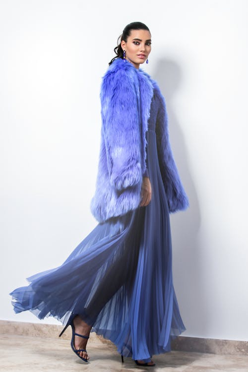 Woman Wearing Blue Fur Coat And Dress