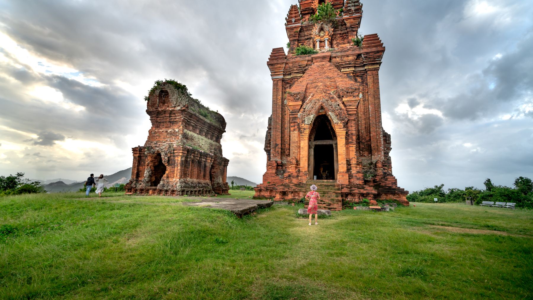 Explore the ancient Champa temple ruins set amidst lush greenery in Vietnam. A glimpse into history.