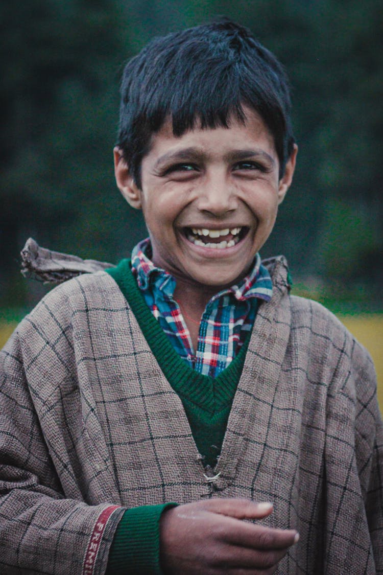 Portrait Of A Boy Laughing